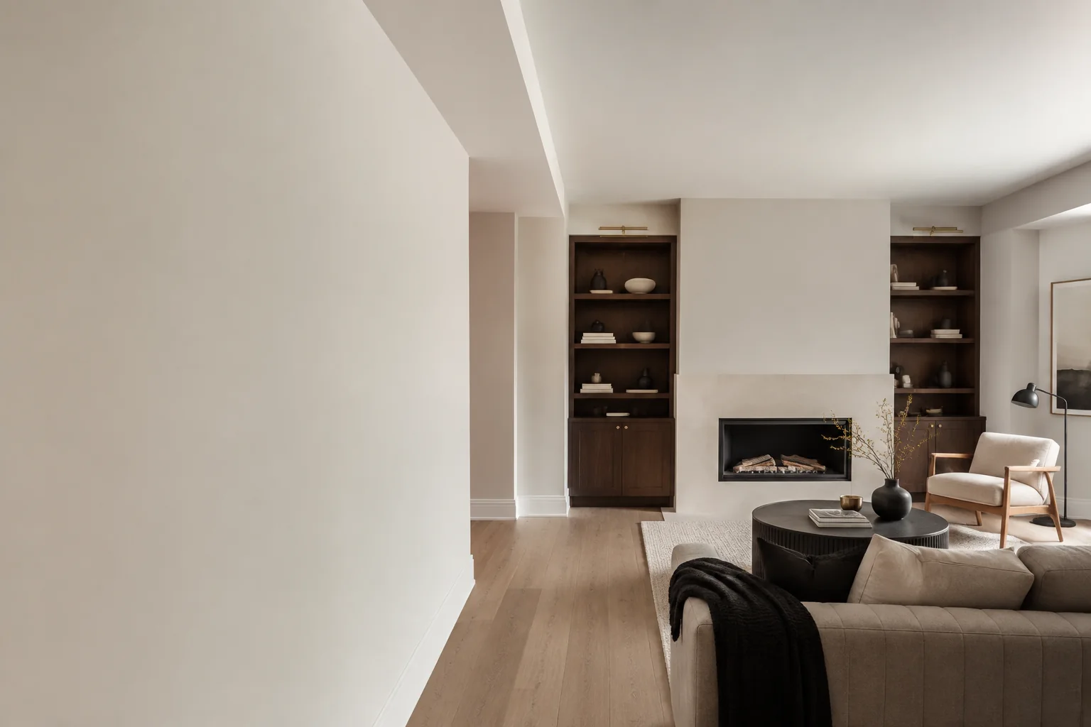 Smooth newly painted drywall walls and ceiling in a warm contemporary living room